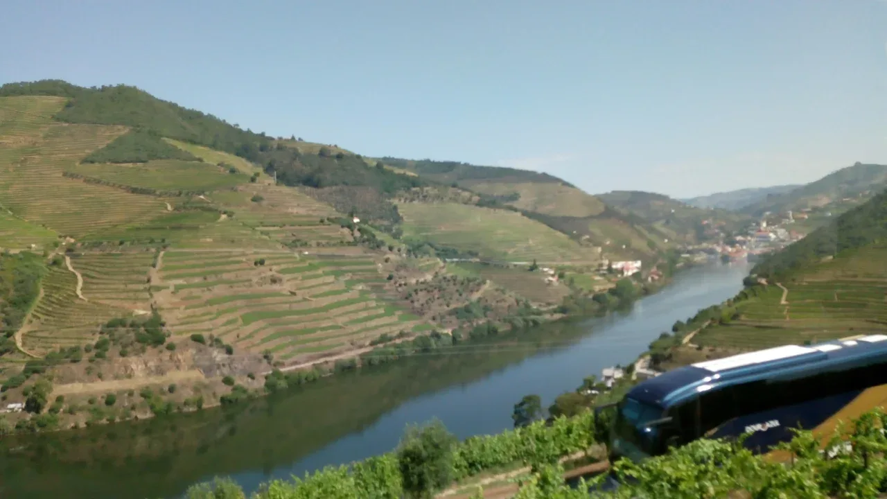 a river running through a valley with Douro in the background