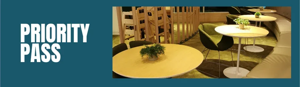 how to get priority pass for free picture of lounge with curved seating, tables and green chairs