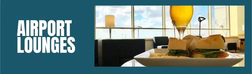 airport lounges post image showing glass of wine and sandwich in airport lounge