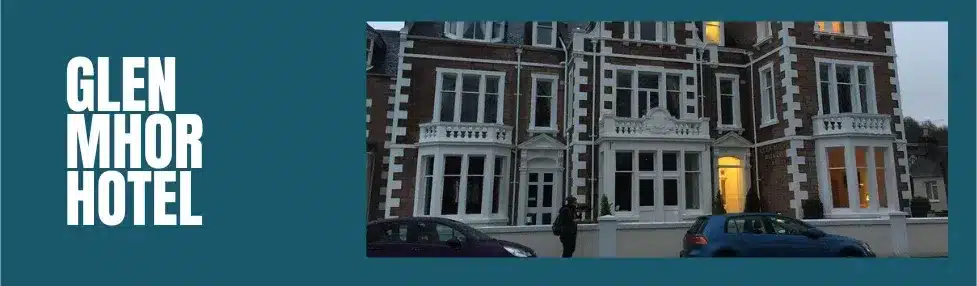 a person walking in front of a building