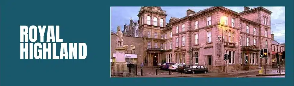 a statue of a man in front of a building
