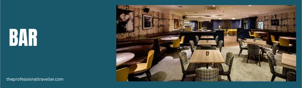 mercure inverness hotel image showing the bar with tables and chairs