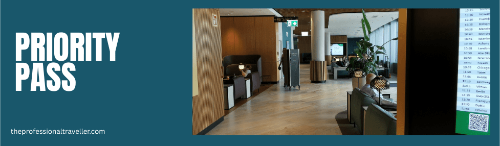 how to use priority pass at uk airport lounges post image showing view into a lounge with flight information board